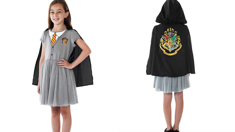 A girl wearing a Hermione costume with a cape.