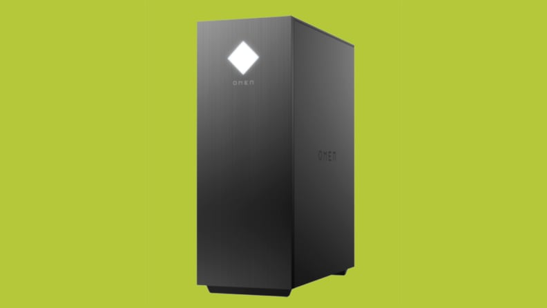 An HP OMEN gaming tower in matte black sits at a slight side angle on a green background.