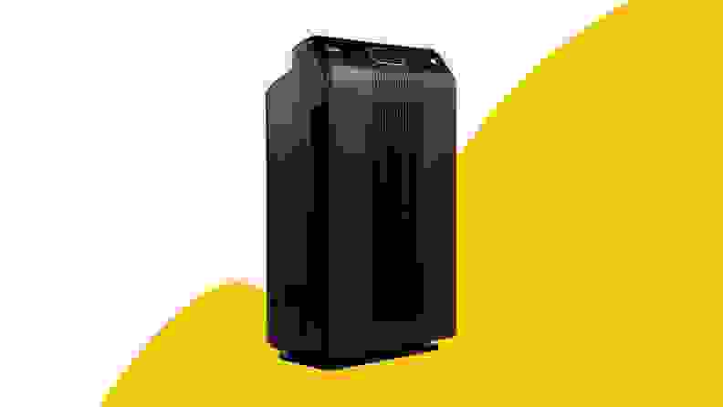 Black air purifier on yellow background
