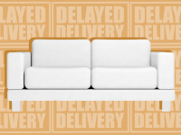 White sofa couch in front of "delayed delivery" phrase.