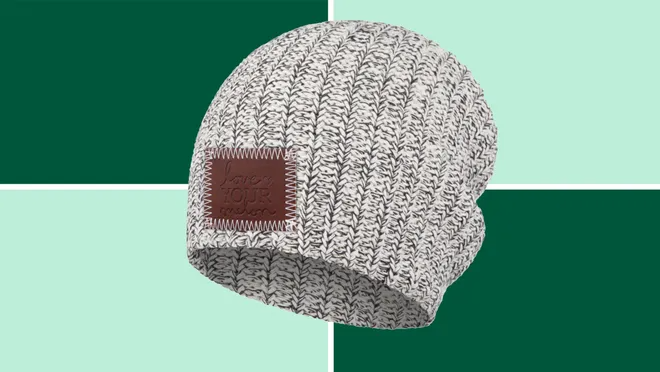 Love Your Melon Beanie on a dark and light green background.