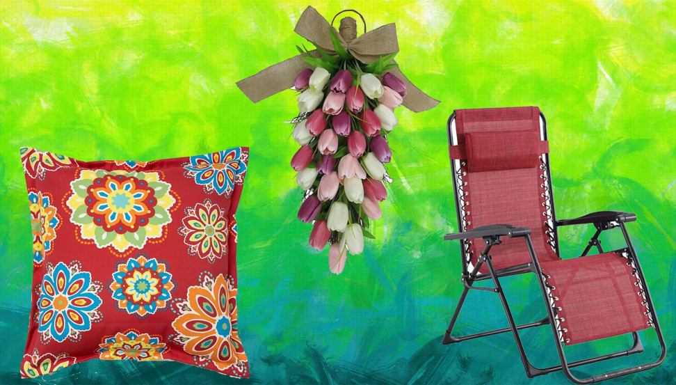 A flowered pillow, a bouquet of tulips, and a red patio chair.