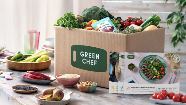 Green Chef box with ingredients and menu cards in front