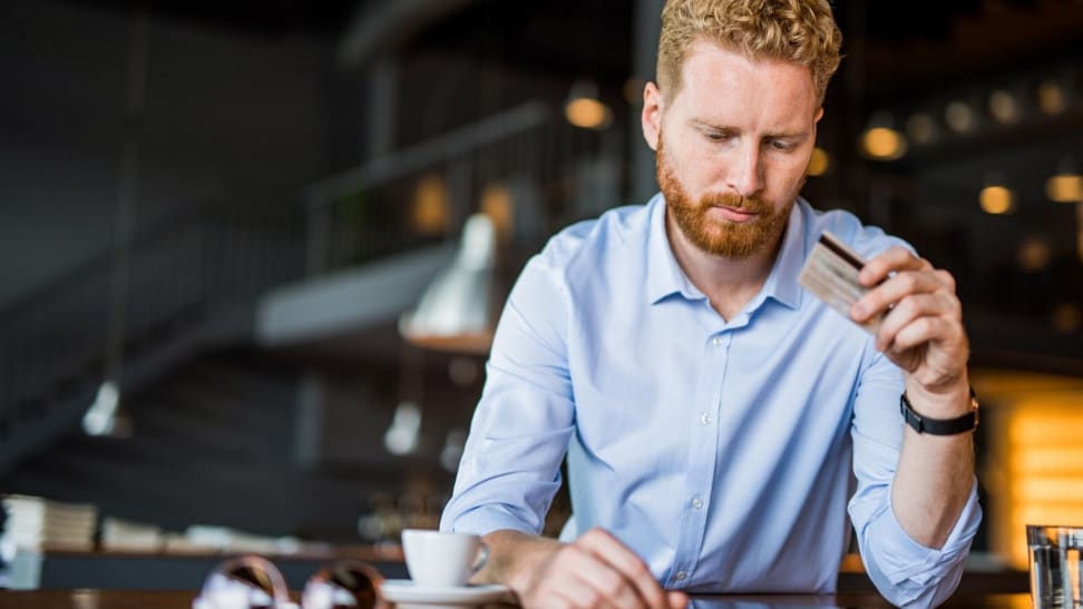 Man holding premium credit card