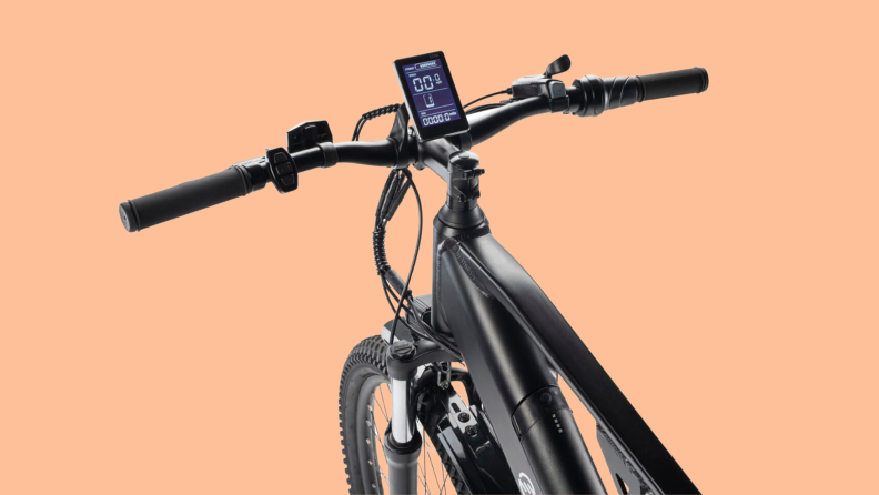 Angled aerial view of the handlebars of the SWFT Apex ebike, with the display mounted at the center.
