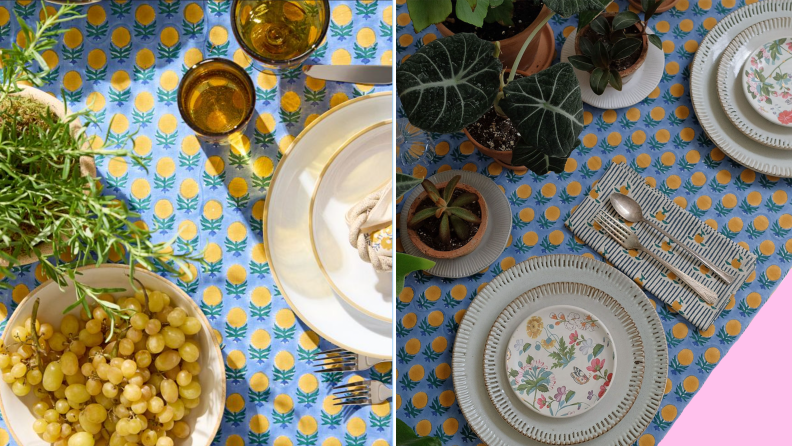 Food and plates sitting on top of blue and yellow spotted tablecloth.