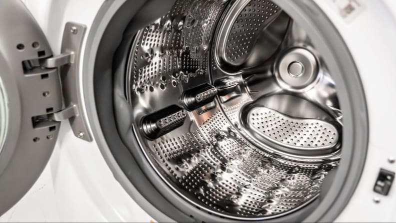 Close up picture of washing machine drum.