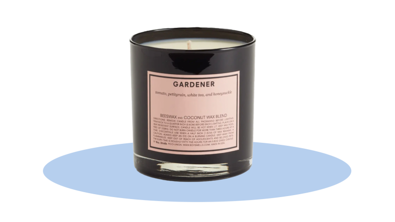 The Boy Smells Gardener Scented Candle in front of a background.