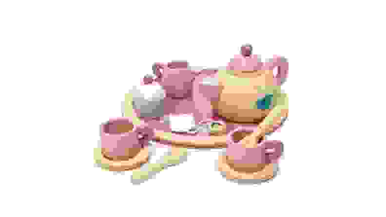 Image of a wooden tea set with bird decorations