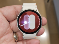 Close-up of a hand holding the Samsung Galaxy Watch7.