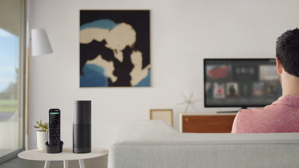 A home theater with an Amazon Echo and Logitech Harmony remote