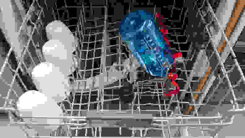 A close-up of the bottle jets on the GE Profile PDP715SBNTS dishwasher's middle rack.