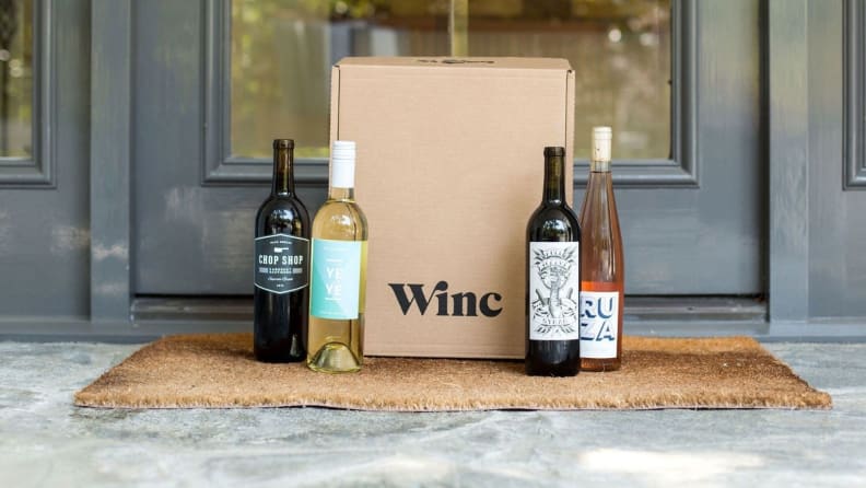 A Winc wine subscription delivery sitting outside a doorstep.