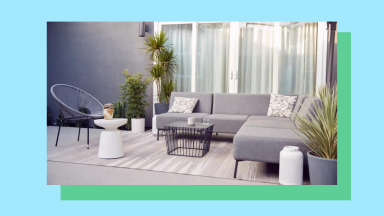 Contemporary patio furniture set-up with a neutral area rug