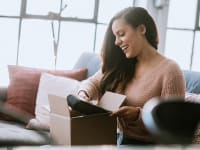 Woman opens a package