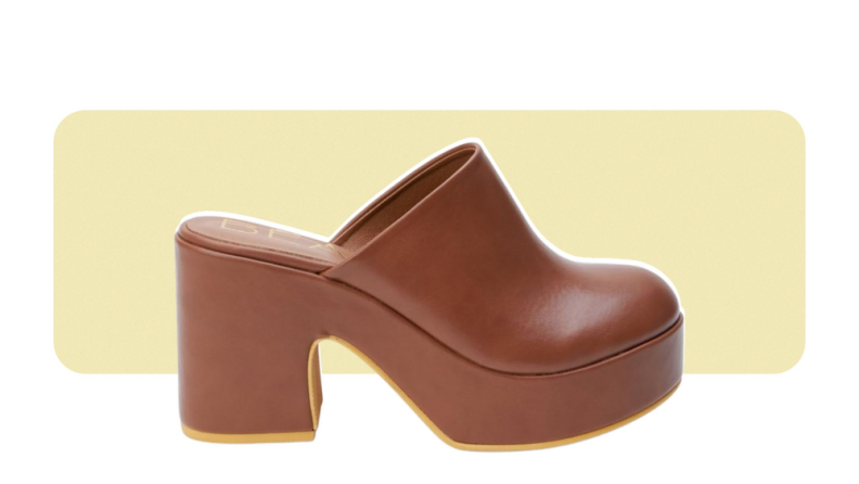 Leather clogs with a high heel and platform sole.