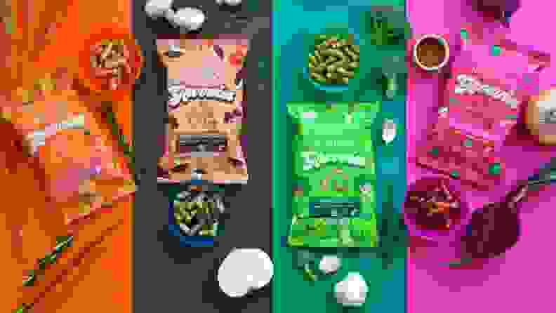 Four brightly colored bags of puffed kids snacks in the following flavors: carrot and rosemary; mushroom, sage, and onion; broccoli, garlic, and thyme; and beet, onion, and paprika.