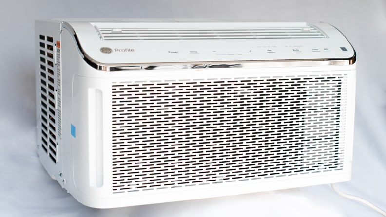 The white GE Profile PHC08LY, the best window air conditioner, is pictured in three-quarters profile.