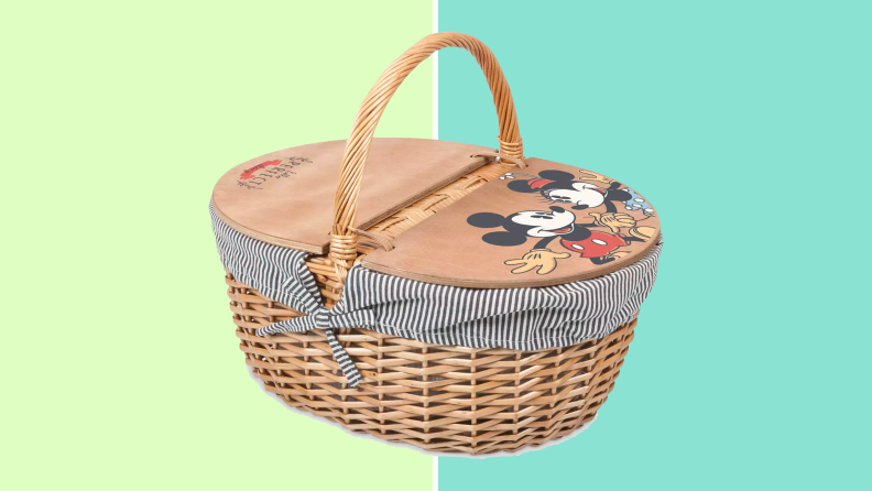 A Mickey Mouse picnic basket on a green background