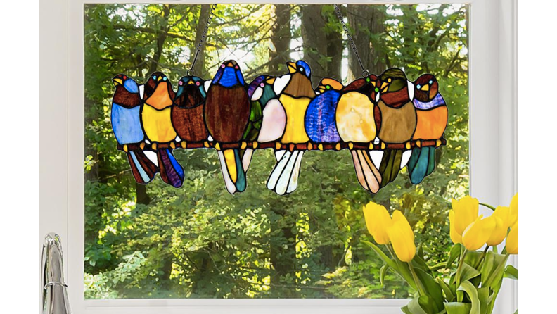 Stained glass depicting ten mulicolored birds