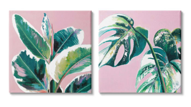Two pink and green canvases of tropical plant leaves.