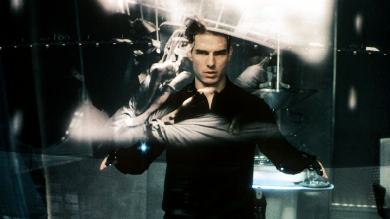 Tom Cruise examines images of the future in a scene from Steven Spielberg’s Minority Report.