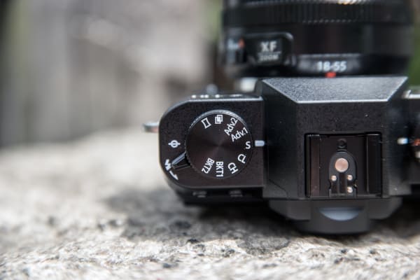 The drive mode dial on the X-T10 offers modes from bracketing to continuous shooting.