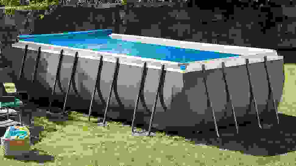 A solar pool cover on top of an above-ground pool.