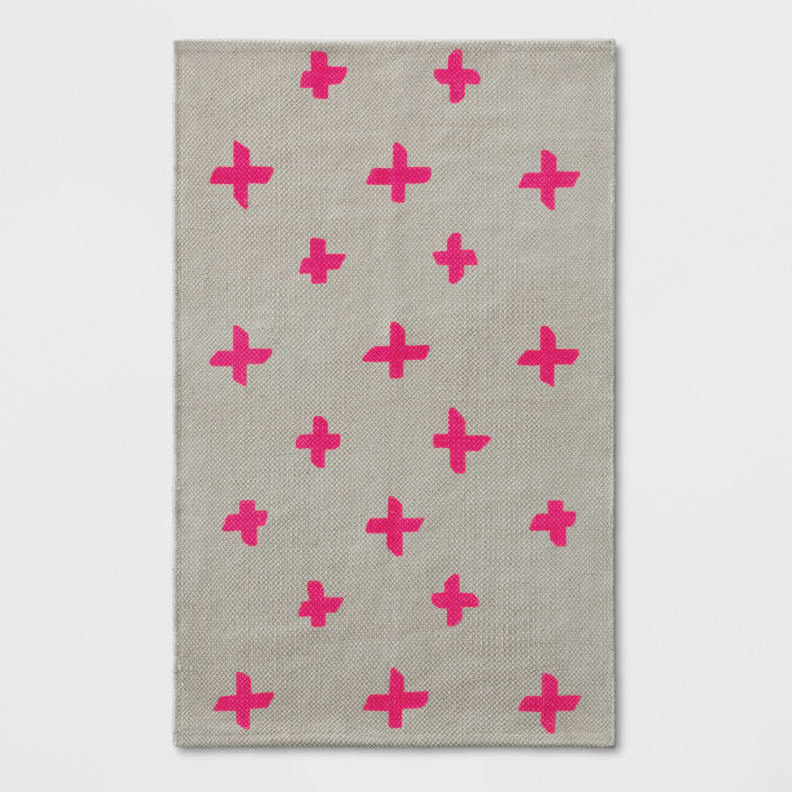 A small rug at your bedside will protect your feet from cold dorm floors
