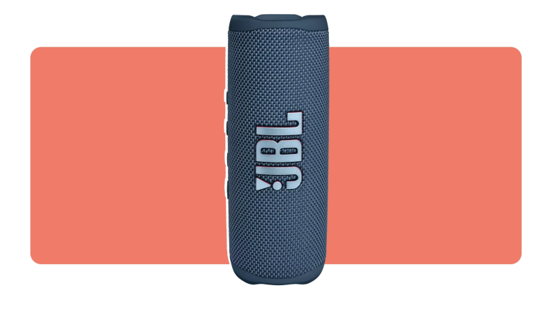 A navy blue JBL Flip 6 Bluetooth Speaker standing vertically with the JBL logo on front.