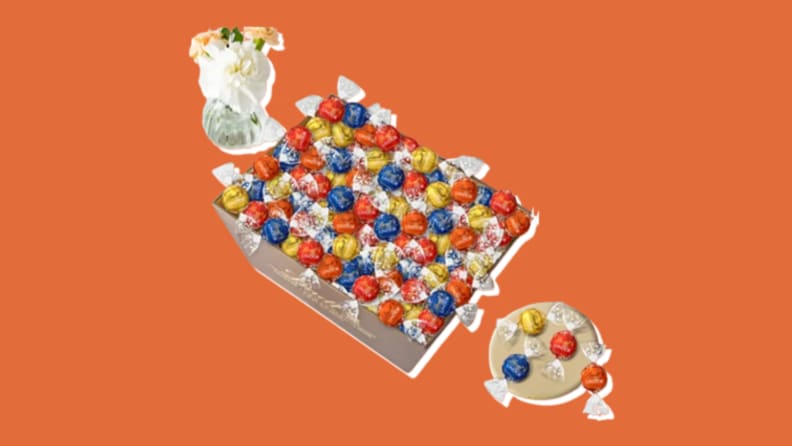 Assorted chocolates from Lindt on an orange background