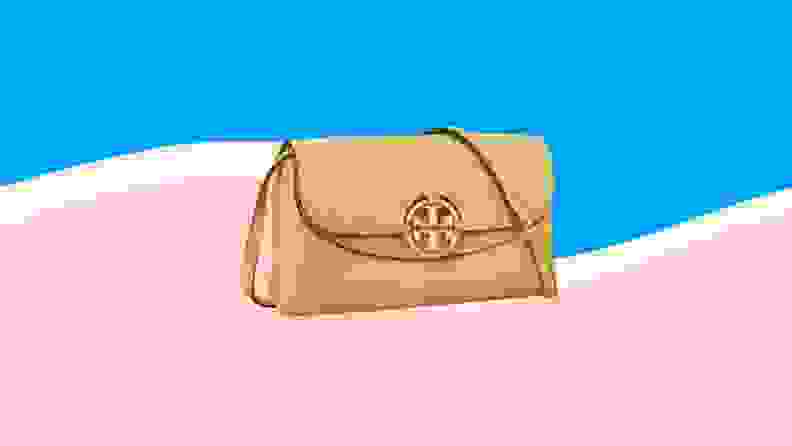 Yellow leather Tory Burch crossbody purse.