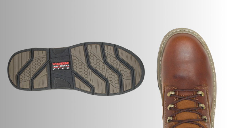A workboot and its sole on a light gray background