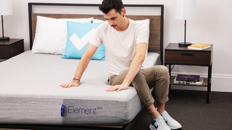 Man sitting on a bed