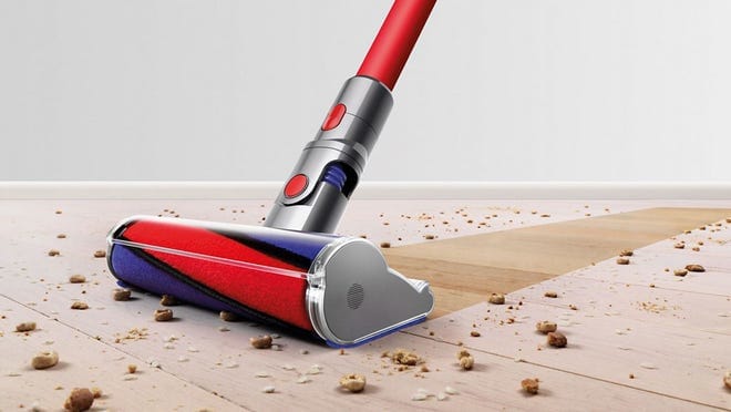 The Dyson V8 vacuums the floor