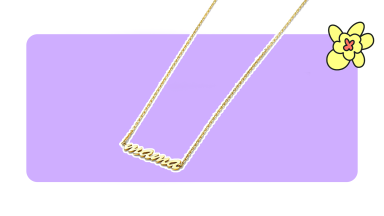 Gold Mama necklace on purple background