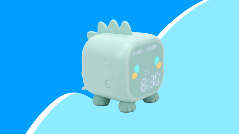 A stegosaurus-style alarm clock in pale green.