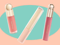 Three Rare Beauty products against a green and peach background