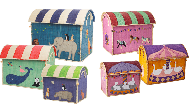 A set of six colorful toy boxes covered in stripes and animals.