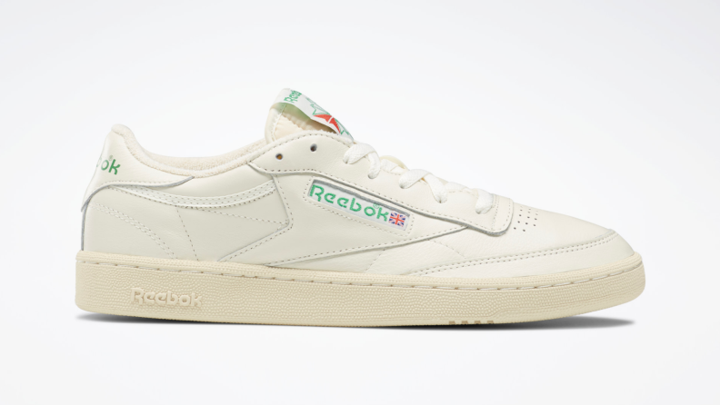 A white Reebok sneaker.