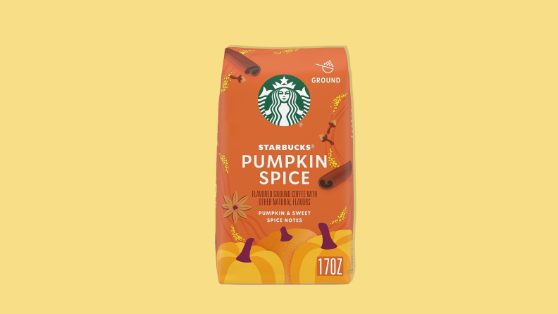 Starbucks Pumpkin Spice ground coffee on a yellow background.