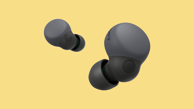 A pair of Sony Earbuds against a light yellow background.
