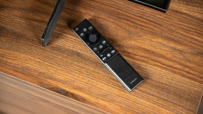 A close-up of the Samsung AU8000's remote control