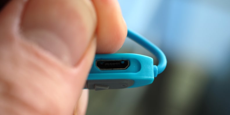 The JLab Epic2's charging port is located on the control cluster.