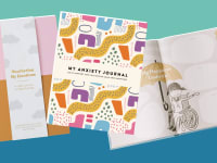 Product shots of mental health journals with multicolored covers.
