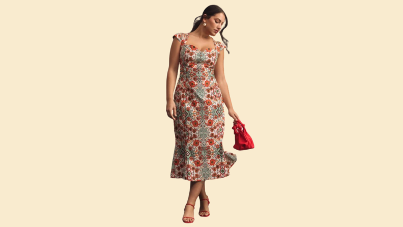 A model wearing a floral-print midi dress.