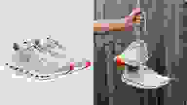 Green sneakers against a blue background, and also being held up by its laces on the right.