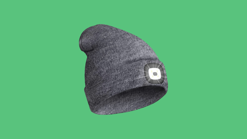 Beanie hat with LED light on green background