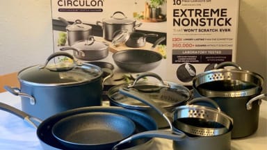 The Circulon ScratchDefense 10-Piece Cookware Set in front of a Circulon ScratchDefense box.