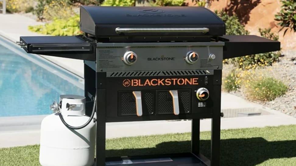 A Blackstone 2-Burner Propane Griddle in an outdoor environment.